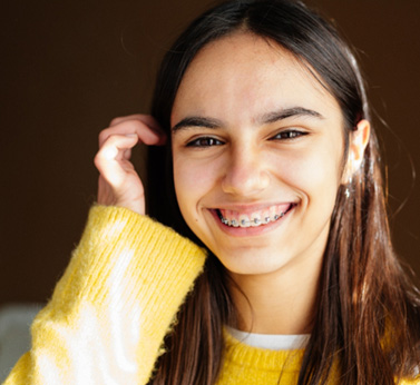 Close-up of safe professional braces on teeth 