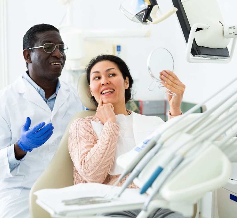 Woman smiling at the dentist