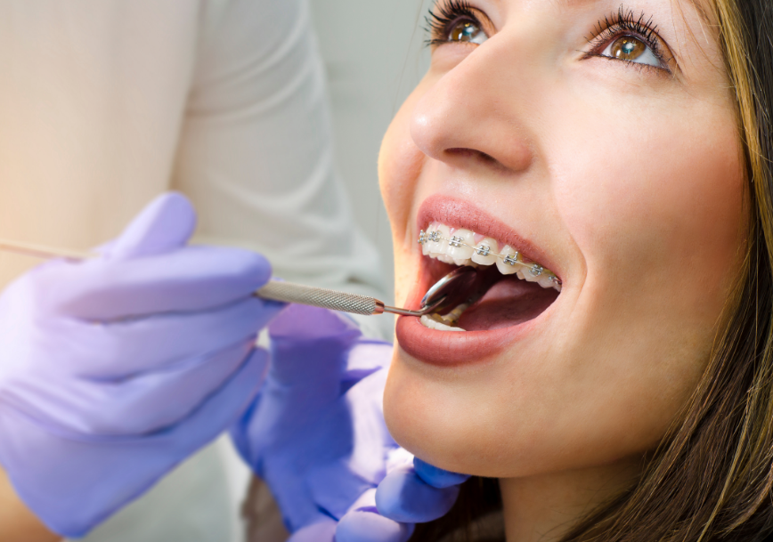 Patient with braces at dental exam